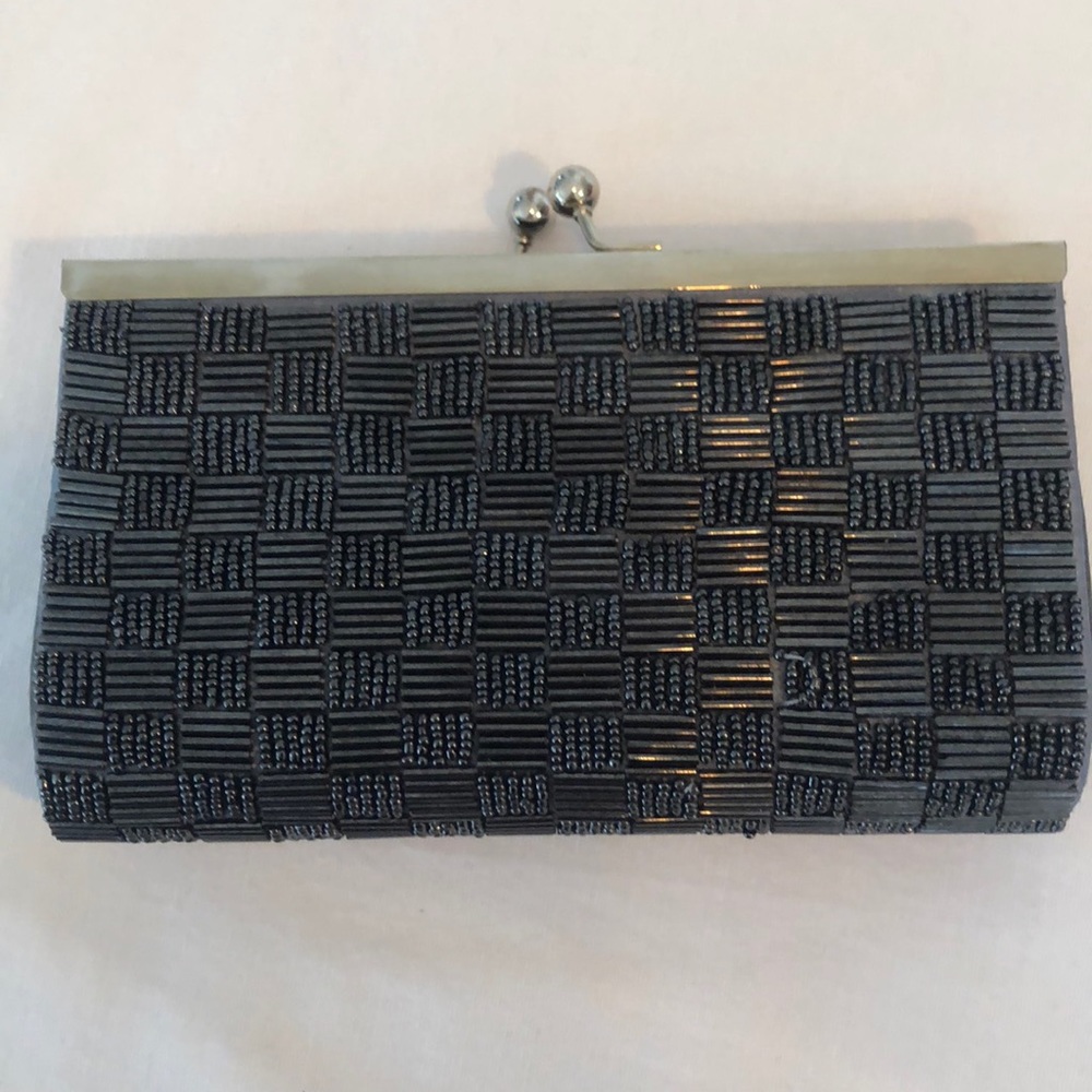 Nina hand clutch